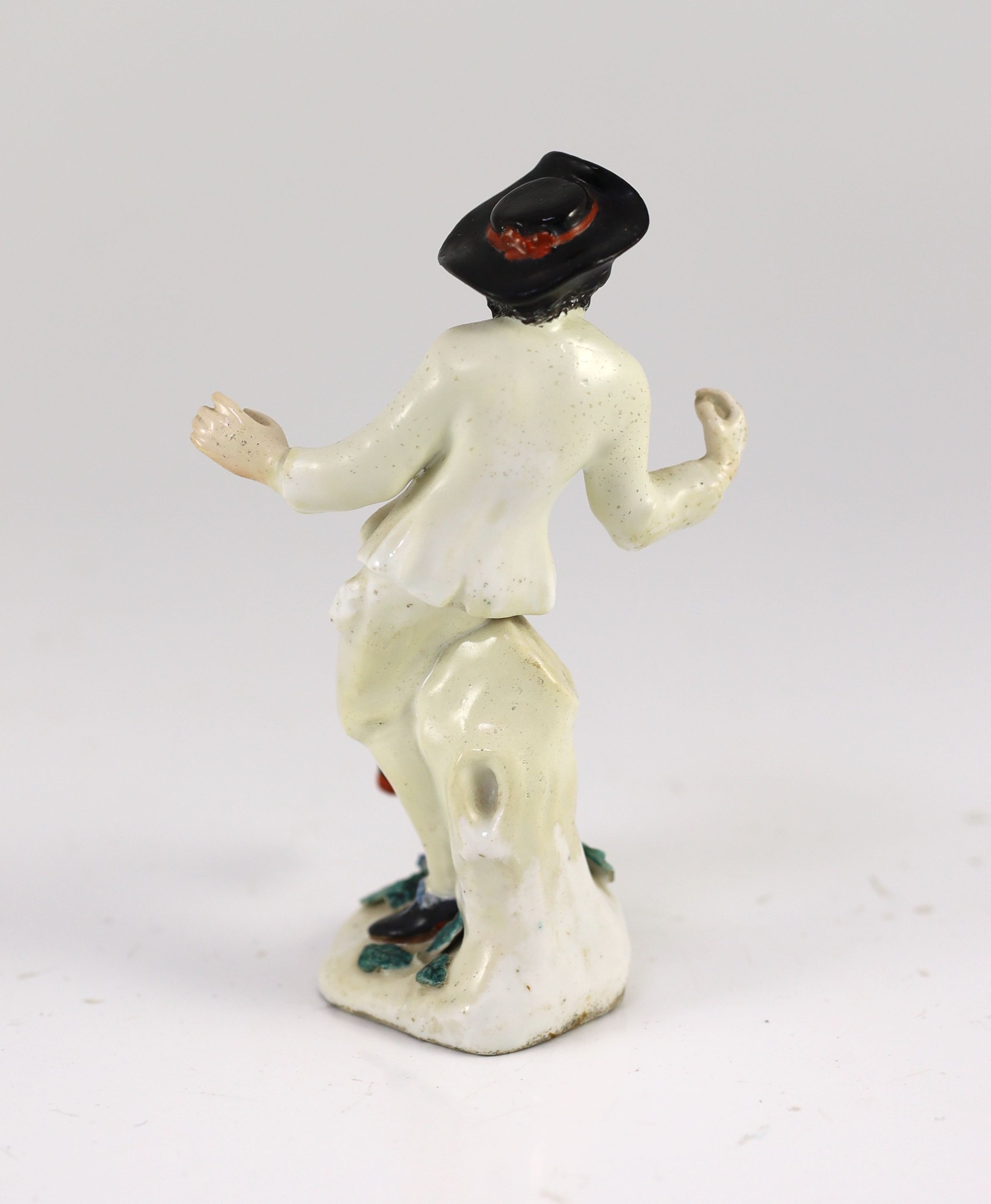 A rare Chelsea figure of a dancing peasant, c.1752-55, probably modelled by Joseph Willems, 15.5 cm high, discoloured restoration